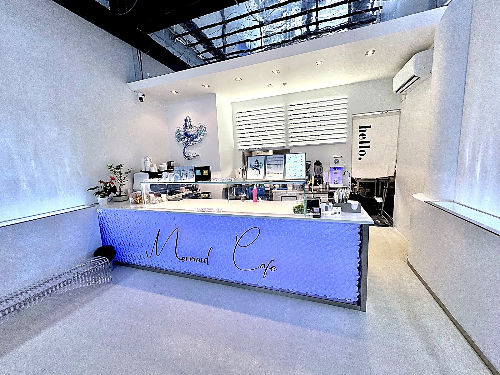 Mermaid sushi cafe interior and illuminated ocean counter on High Street Auckland